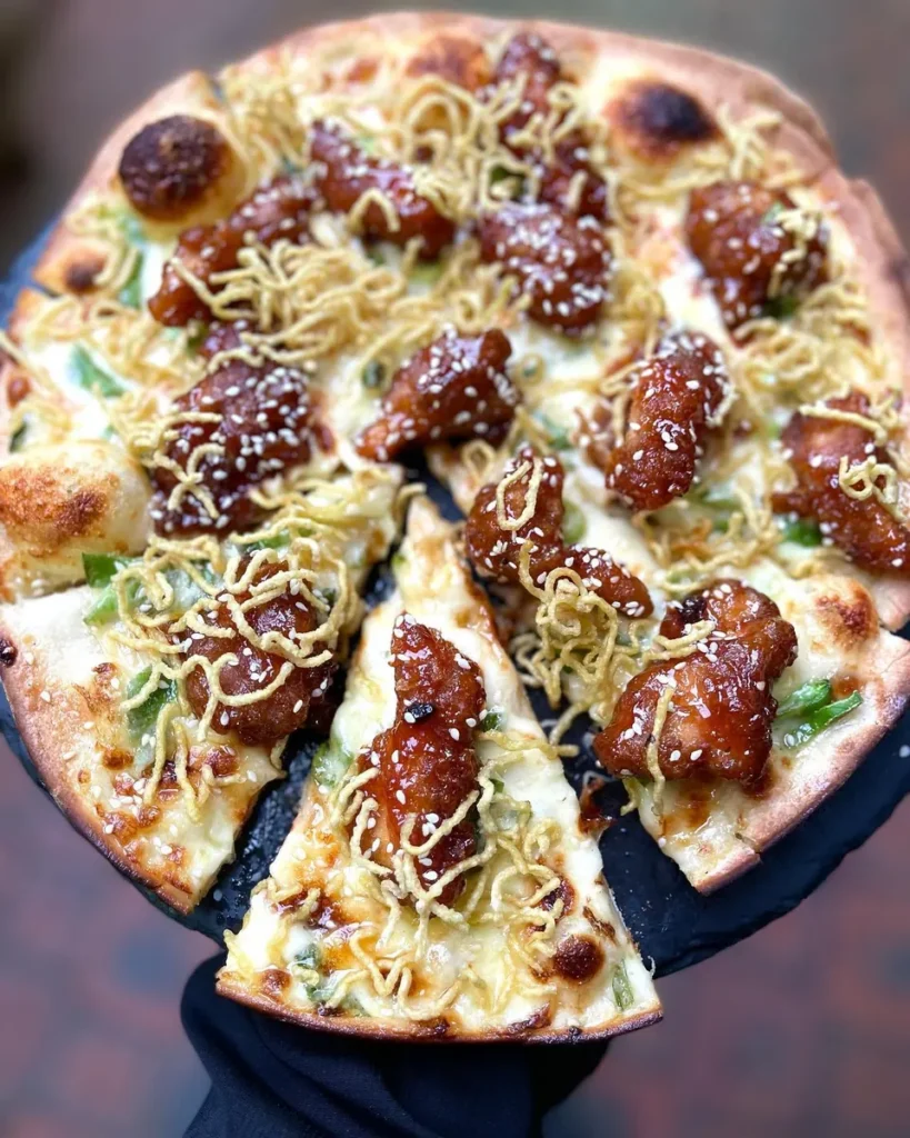 Woodfired pizza with meatballs and melted cheese