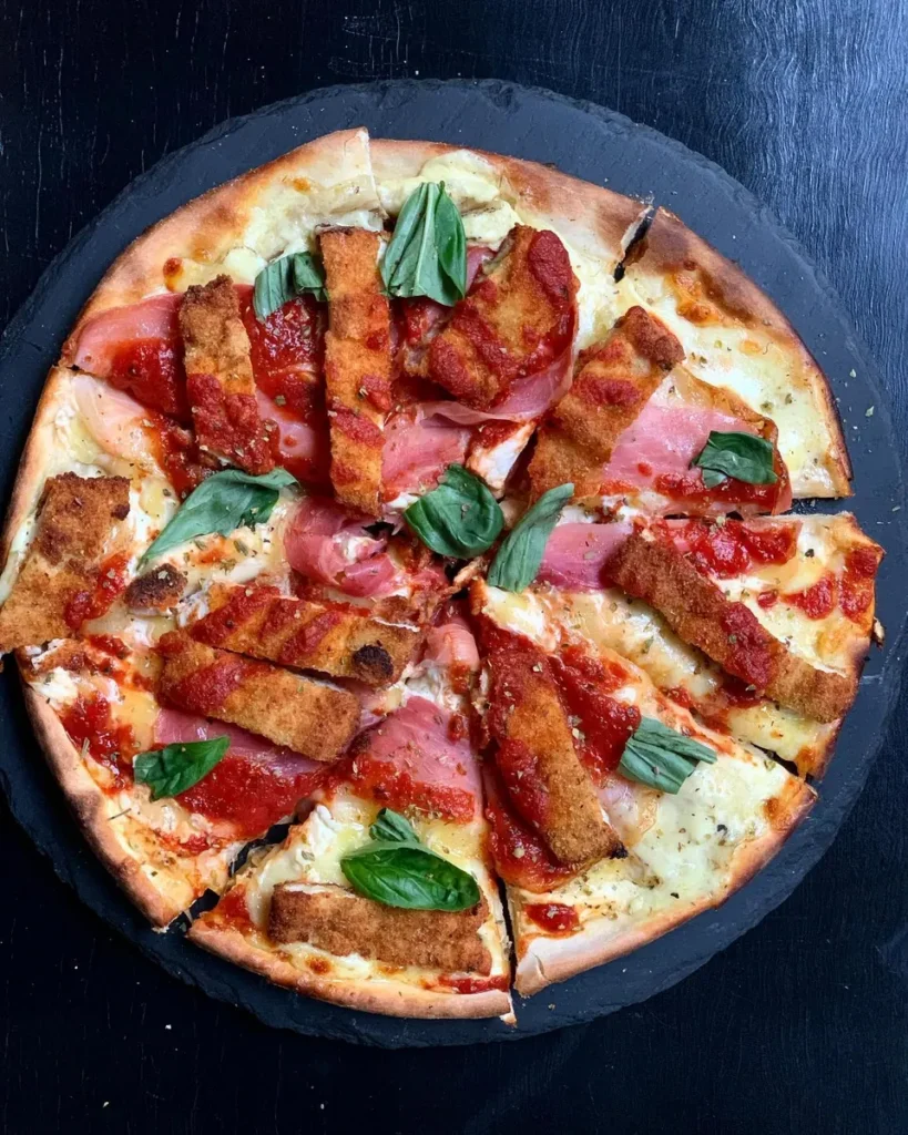 Woodfired salami and rocket pizza